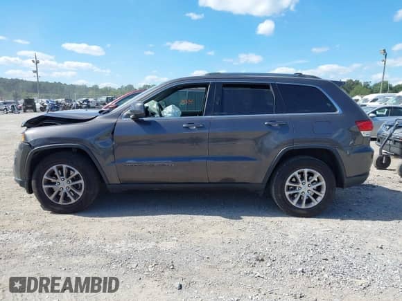 2021 Jeep Grand Cherokee Laredo E with VIN 1C4RJEAG8MC784333, listed as a IAAI auction lot 43093505 with 77,345 mi miles and . Bid and sale history available at DreamBid. Image 14.