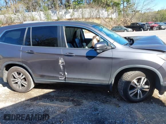 2016 Honda Pilot EX-L z VIN 5FNYF6H55GB007686, wystawiony jako IAAI lot #43396070 z przebiegiem 161 258 mil mil oraz . Historia ofert i sprzedaży dostępna na DreamBid. Obrazek 13.