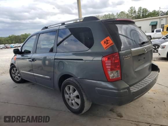 2007 Hyundai Entourage GLS with VIN KNDMC233076019620, listed as a Copart auction lot 82225025 with 270,997 mi miles and Salvage title. Bid and sale history available at DreamBid. Image 2.