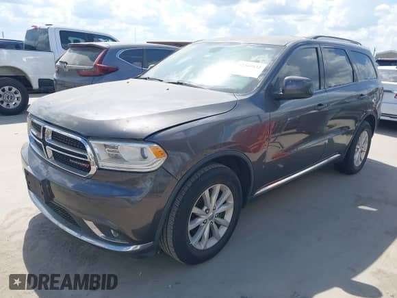 2014 Dodge Durango SXT with VIN 1C4RDHAG1EC975585, listed as a IAAI auction lot 43369132 with 189,916 mi miles and . Bid and sale history available at DreamBid. Image 2.