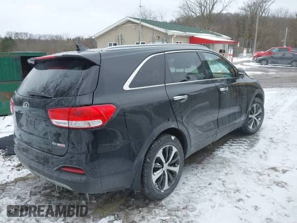 2018 Kia Sorento EX z VIN 5XYPHDA14JG360275, wystawiony jako IAAI lot #41639019 z przebiegiem 74 328 mil mil oraz . Historia ofert i sprzedaży dostępna na DreamBid. Obrazek 4.
