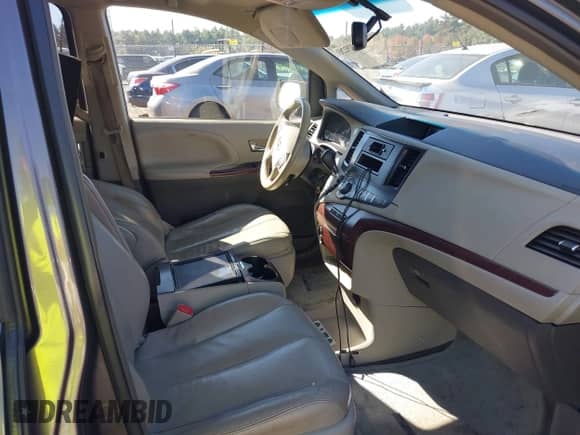2012 Toyota Sienna XLE with VIN 5TDDK3DC8CS048347, listed as a IAAI auction lot 43292283 with 249,466 mi miles and . Bid and sale history available at DreamBid. Image 5.