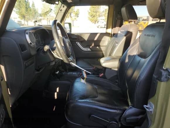 2013 Jeep Wrangler Rubicon with VIN 1C4HJWCG8DL535223, listed as a Copart auction lot 86492615 with 124,963 mi miles and Salvage title. Bid and sale history available at DreamBid. Image 7.