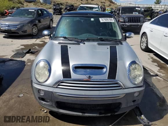 2006 MINI Hardtop S with VIN WMWRE33586TJ37385, listed as a Copart auction lot 67606184 with 78,671 mi miles and Salvage title. Bid and sale history available at DreamBid. Image 5.