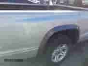 2002 Dodge Dakota z VIN 1B7GL12X42S708569, wystawiony jako IAAI lot #43535850 z przebiegiem 225 885 mil mil oraz . Historia ofert i sprzedaży dostępna na DreamBid. Obrazek 14.