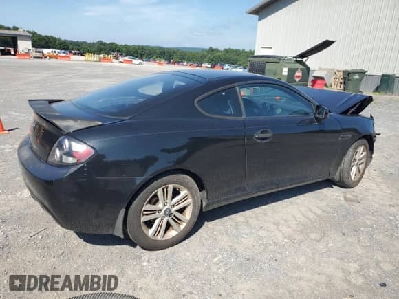 2008 Hyundai Tiburon GS с VIN KMHHM66D58U291261, выставлен на аукционе Copart как лот 66601515 с пробегом 121 376 миль миль и Списание • Salvage title. История ставок и продаж доступна на DreamBid. Изображение 3.
