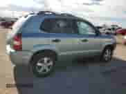 2006 Hyundai Tucson GL z VIN KM8JM12B06U441170, wystawiony jako Copart lot #70923275 z przebiegiem 172 027 mil mil oraz Czysty tytuł • Clean title. Historia ofert i sprzedaży dostępna na DreamBid. Obrazek 3.