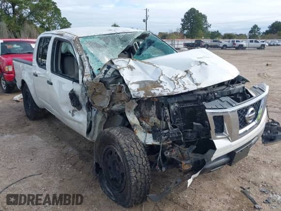 2017 Nissan Frontier SV with VIN 1N6DD0EV2HN765247, listed as a IAAI auction lot 41017764 with 141,942 mi miles and . Bid and sale history available at DreamBid. Image 6.
