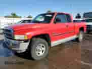 2000 Dodge 1500 z VIN 1B7HF13Z0YJ117908, wystawiony jako Copart lot #72387474 z przebiegiem 107 710 mil mil oraz Szkoda całkowita • Salvage title. Historia ofert i sprzedaży dostępna na DreamBid. Obrazek 1.