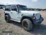 2020 Jeep Wrangler Sport S with VIN 1C4GJXAG5LW302823, listed as a Copart auction lot 71611065 with 67,430 mi miles and Salvage title. Bid and sale history available at DreamBid. Image 4.