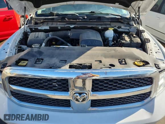 2019 Ram 1500 Tradesman z VIN 1C6RR6FG5KS661154, wystawiony jako Copart lot #82043725 z przebiegiem 182 356 mil mil oraz Szkoda całkowita • Salvage title. Historia ofert i sprzedaży dostępna na DreamBid. Obrazek 11.