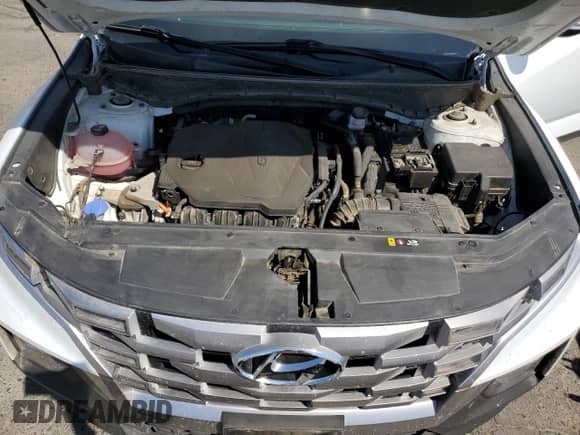 2022 Hyundai Santa Cruz SEL with VIN 5NTJCDAE9NH017954, listed as a Copart auction lot 70330024 with 61,631 mi miles and Salvage title. Bid and sale history available at DreamBid. Image 11.