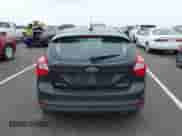 2014 Ford Focus Titanium with VIN 1FADP3N27EL114825, listed as a IAAI auction lot 43217005 with 148,002 mi miles and . Bid and sale history available at DreamBid. Image 16.