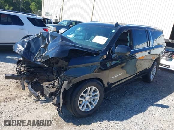 2023 Chevrolet Suburban LT with VIN 1GNSCCKD4PR410055, listed as a IAAI auction lot 43138016 with Not provided miles and . Bid and sale history available at DreamBid. Image 16.