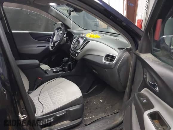 2020 Chevrolet Equinox LT z VIN 3GNAXKEV0LS630816, wystawiony jako IAAI lot #43281392 z przebiegiem 53 353 mil mil oraz . Historia ofert i sprzedaży dostępna na DreamBid. Obrazek 5.