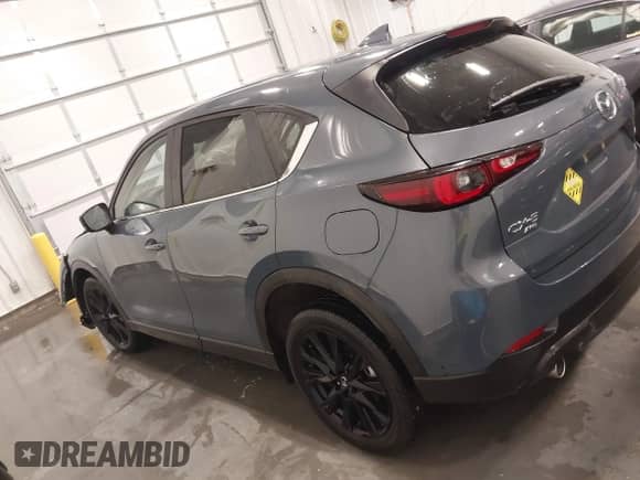 2022 Mazda CX-5 S Preferred z VIN JM3KFBCM0N0644033, wystawiony jako IAAI lot #41620156 z przebiegiem 23 280 mil mil oraz . Historia ofert i sprzedaży dostępna na DreamBid. Obrazek 15.