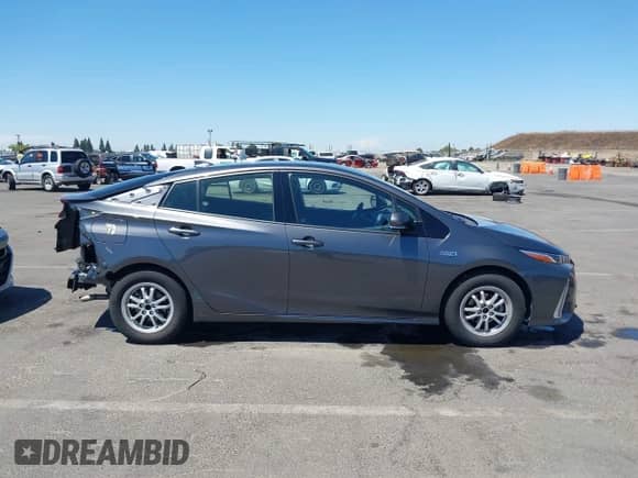 2018 Toyota Prius Plus z VIN JTDKARFP3J3073801, wystawiony jako IAAI lot #42903373 z przebiegiem 90 429 mil mil oraz . Historia ofert i sprzedaży dostępna na DreamBid. Obrazek 14.