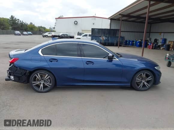 2021 BMW 3 Series 330i с VIN 3MW5R1J09M8B86677, выставлен на аукционе IAAI как лот 43432487 с пробегом 74 515 миль миль и . История ставок и продаж доступна на DreamBid. Изображение 14.
