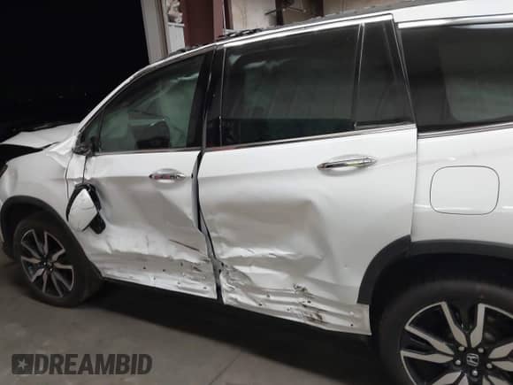 2020 Honda Pilot Touring 8-Passenger с VIN 5FNYF5H92LB014473, выставлен на аукционе IAAI как лот 42711125 с пробегом 50 117 миль миль и . История ставок и продаж доступна на DreamBid. Изображение 14.