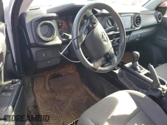 2021 Toyota Tacoma SR с VIN 3TYRX5GN3MT005928, выставлен на аукционе Copart как лот 55757665 с пробегом 139 272 миль миль и Списание • Salvage title. История ставок и продаж доступна на DreamBid. Изображение 8.