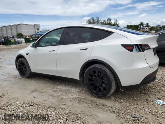 2024 Tesla Model Y z VIN 7SAYGDED6RF098213, wystawiony jako Copart lot #84432265 z przebiegiem 11 983 mil mil oraz Szkoda całkowita • Salvage title. Historia ofert i sprzedaży dostępna na DreamBid. Obrazek 2.