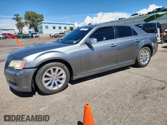2012 Chrysler 300 Limited с VIN 2C3CCACG5CH250261, выставлен на аукционе Copart как лот 71208735 с пробегом 204 553 миль миль и Списание • Salvage title. История ставок и продаж доступна на DreamBid. Изображение 1.