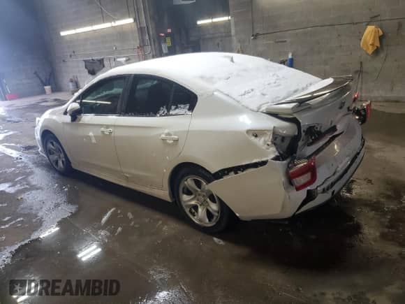 2020 Subaru Impreza Limited with VIN 4S3GKAU63L3604724, listed as a Copart auction lot 86184604 with 153,504 mi miles and Salvage title. Bid and sale history available at DreamBid. Image 2.