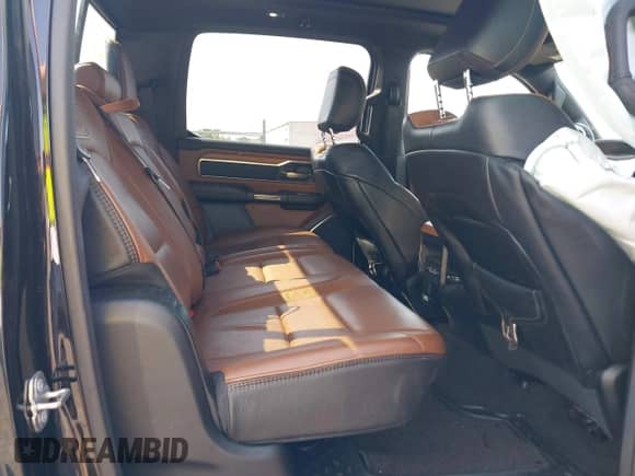 2020 Ram 1500 Longhorn with VIN 1C6SRFKT5LN117418, listed as a IAAI auction lot 42236803 with 96,338 mi miles and . Bid and sale history available at DreamBid. Image 8.