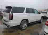 2022 Cadillac Escalade Premium Luxury с VIN 1GYS4BKL3NR164999, выставлен на аукционе Copart как лот 58035295 с пробегом 42 871 миль миль и Списание • Salvage title. История ставок и продаж доступна на DreamBid. Изображение 3.