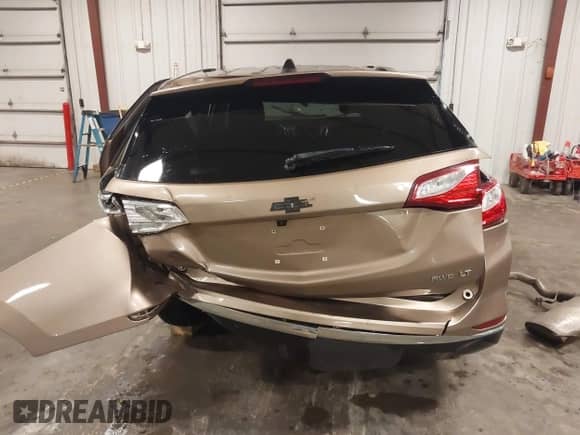 2019 Chevrolet Equinox LT z VIN 2GNAXTEV3K6137229, wystawiony jako IAAI lot #43252422 z przebiegiem 151 840 mil mil oraz . Historia ofert i sprzedaży dostępna na DreamBid. Obrazek 12.