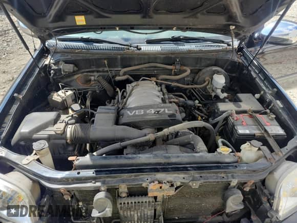 2004 Toyota Tundra SR5 z VIN 5TBBT44124S442610, wystawiony jako Copart lot #70451445 z przebiegiem 258 271 mil mil oraz Czysty tytuł • Clean title. Historia ofert i sprzedaży dostępna na DreamBid. Obrazek 11.