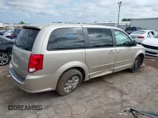 2014 Dodge Grand Caravan SE with VIN 2C4RDGBG8ER309405, listed as a IAAI auction lot 43276389 with 242,036 mi miles and . Bid and sale history available at DreamBid. Image 4.