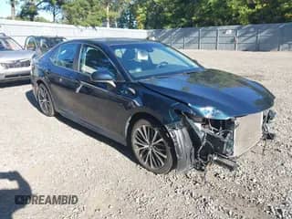 2019 Toyota Camry SE z VIN 4T1B11HK9KU261801, wystawiony jako IAAI lot #43351848 z przebiegiem 83 676 mil mil oraz . Historia ofert i sprzedaży dostępna na DreamBid. Obrazek 1.