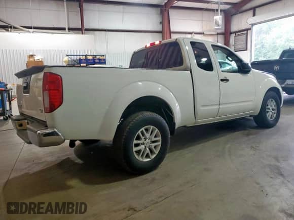 2017 Nissan Frontier SV with VIN 1N6BD0CTXHN737530, listed as a Copart auction lot 70869045 with 95,789 mi miles and Salvage title. Bid and sale history available at DreamBid. Image 3.