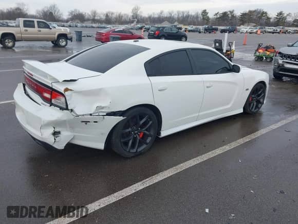 2013 Dodge Charger SRT-8 z VIN 2C3CDXEJXDH675646, wystawiony jako IAAI lot #41464139 z przebiegiem 105 583 mil mil oraz . Historia ofert i sprzedaży dostępna na DreamBid. Obrazek 4.