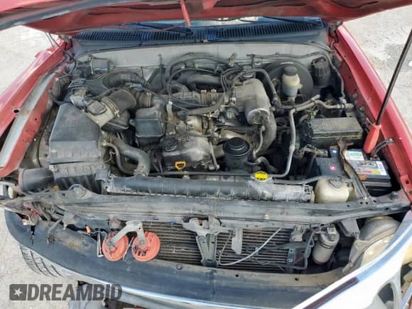 2004 Toyota Tacoma PreRunner with VIN 5TENM92N74Z464206, listed as a Copart auction lot 84038115 with 217,428 mi miles and Salvage title. Bid and sale history available at DreamBid. Image 11.