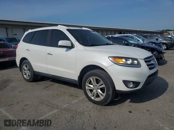 2012 Hyundai Santa Fe Limited с VIN 5XYZK3AB0CG140499, выставлен на аукционе Copart как лот 80169945 с пробегом 224 116 миль миль и Списание • Salvage title. История ставок и продаж доступна на DreamBid. Изображение 4.