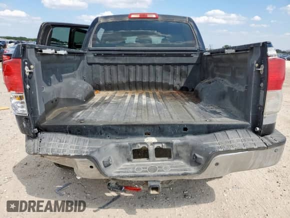 2012 Toyota Tundra Limited z VIN 5TFFY5F10CX128010, wystawiony jako Copart lot #71779725 z przebiegiem 309 990 mil mil oraz Szkoda całkowita • Salvage title. Historia ofert i sprzedaży dostępna na DreamBid. Obrazek 6.