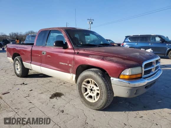 2001 Dodge Dakota с VIN 1B7GL22XX1S326857, выставлен на аукционе Copart как лот 88671035 с пробегом Не указан миль и Списание • Salvage title. История ставок и продаж доступна на DreamBid. Изображение 4.