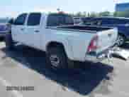 2014 Toyota Tacoma PreRunner z VIN 5TFJX4GN0EX030638, wystawiony jako IAAI lot #43008674 z przebiegiem 94 142 mil mil oraz . Historia ofert i sprzedaży dostępna na DreamBid. Obrazek 3.