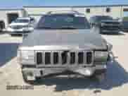 1998 Jeep Grand Cherokee Limited z VIN 1J4GZ78S5WC325148, wystawiony jako Copart lot #67780424 z przebiegiem Nie podano mil oraz Szkoda całkowita • Salvage title. Historia ofert i sprzedaży dostępna na DreamBid. Obrazek 5.