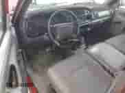 2001 Dodge 1500 Work Special z VIN 1B7HC16X51S218946, wystawiony jako Copart lot #65726535 z przebiegiem 272 045 mil mil oraz Szkoda całkowita • Salvage title. Historia ofert i sprzedaży dostępna na DreamBid. Obrazek 8.
