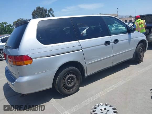 2004 Honda Odyssey LX with VIN 5FNRL18554B021938, listed as a IAAI auction lot 42298603 with 210,105 mi miles and . Bid and sale history available at DreamBid. Image 4.
