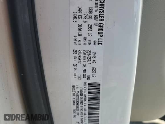 2013 Dodge Grand Caravan SXT with VIN 2C4RDGCG9DR618622, listed as a Copart auction lot 90457375 with 181,498 mi miles and Salvage title. Bid and sale history available at DreamBid. Image 13.