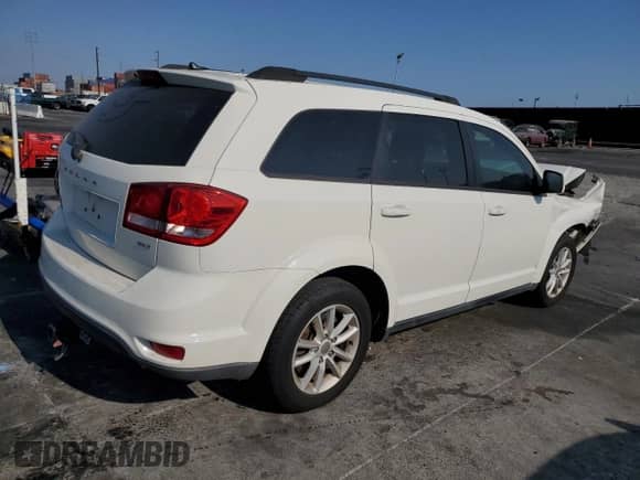 2013 Dodge Journey SXT with VIN 3C4PDCBB6DT562559, listed as a Copart auction lot 67866535 with 95,735 mi miles and Non repairable. Bid and sale history available at DreamBid. Image 3.