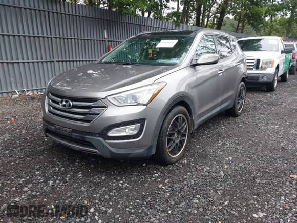 2015 Hyundai Santa Fe with VIN 5XYZWDLA2FG275504, listed as a IAAI auction lot 43030496 with 93,414 mi miles and . Bid and sale history available at DreamBid. Image 2.