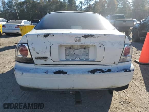 1994 Honda Accord LX z VIN 1HGCD5639RA156529, wystawiony jako Copart lot #85973584 z przebiegiem 144 699 mil mil oraz Szkoda całkowita • Salvage title. Historia ofert i sprzedaży dostępna na DreamBid. Obrazek 6.