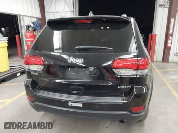 2021 Jeep Grand Cherokee Laredo E with VIN 1C4RJEAG7MC738928, listed as a IAAI auction lot 42708702 with 63,329 mi miles and . Bid and sale history available at DreamBid. Image 16.