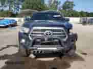 2016 Toyota Tacoma SR5 z VIN 3TMAZ5CNXGM017958, wystawiony jako Copart lot #81539005 z przebiegiem 121 102 mil mil oraz Szkoda całkowita • Salvage title. Historia ofert i sprzedaży dostępna na DreamBid. Obrazek 5.