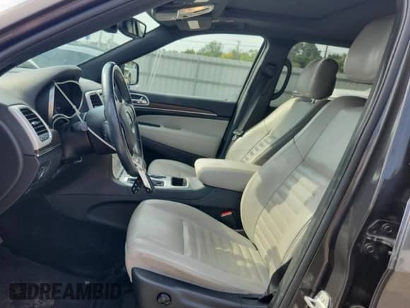 2018 Jeep Grand Cherokee Sterling with VIN 1C4RJEBG4JC145179, listed as a Copart auction lot 69403845 with 106,658 mi miles and Salvage title. Bid and sale history available at DreamBid. Image 7.